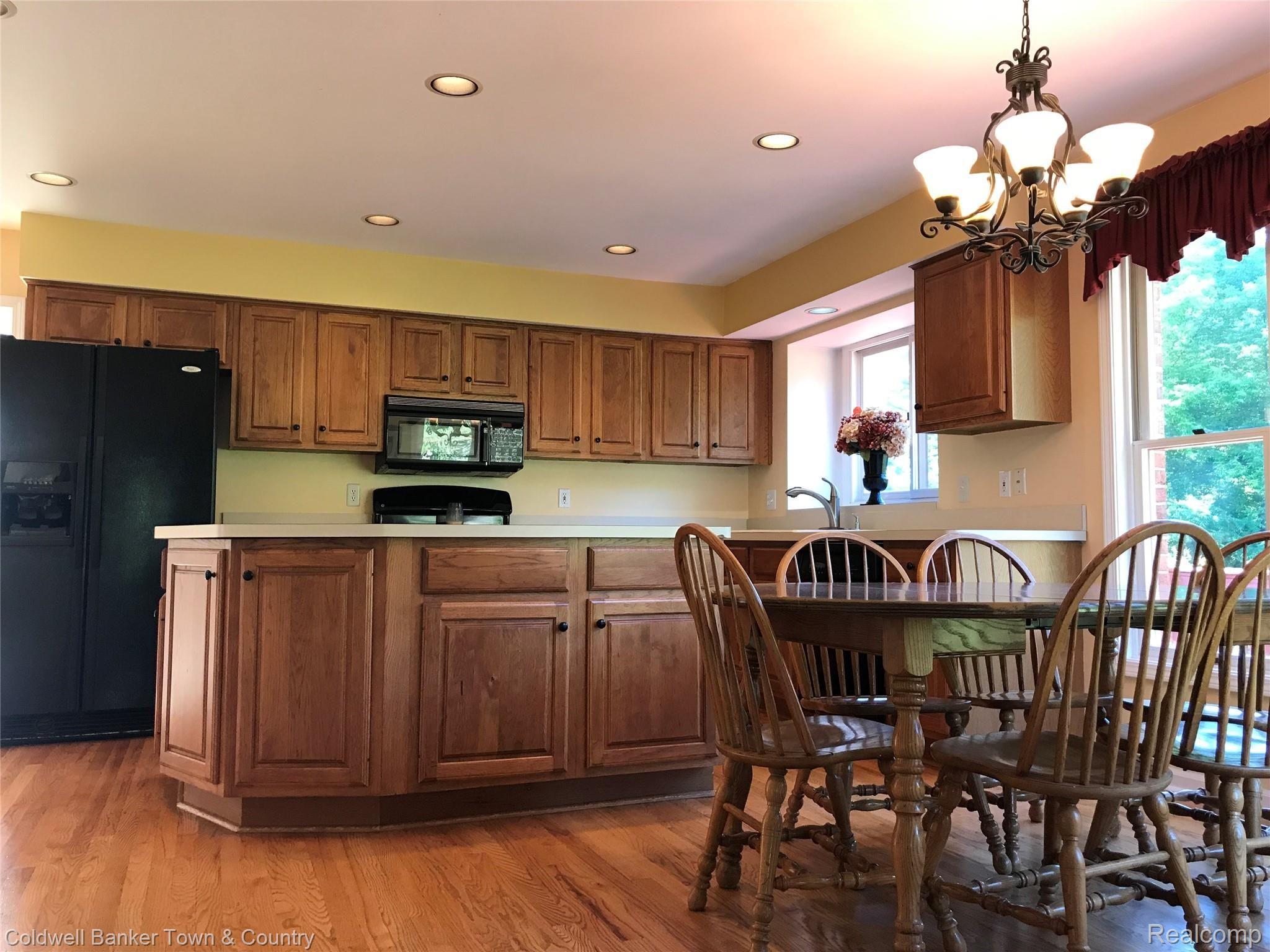 4400 Brighton Road Howell, MI 48843 - Photo 8 of 22 Breakfast nook, wood floors