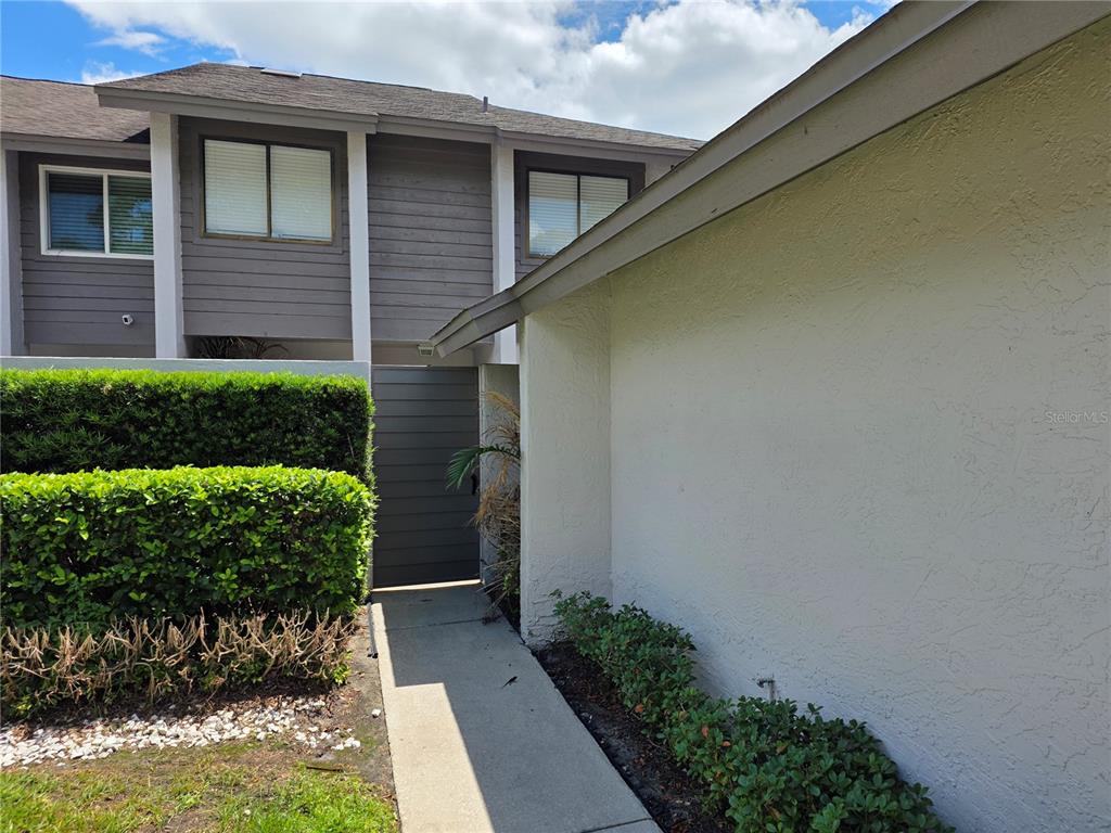 162 Olive Tree Circle Altamonte Springs, FL 32714 - Photo 2 of 47 a front view of a house with a yard