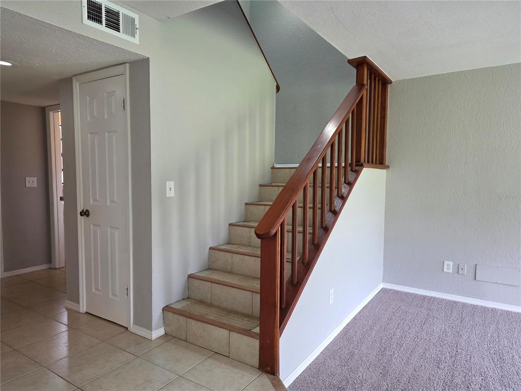 162 Olive Tree Circle Altamonte Springs, FL 32714 - Photo 24 of 47 a view of entryway and hall with wooden floor
