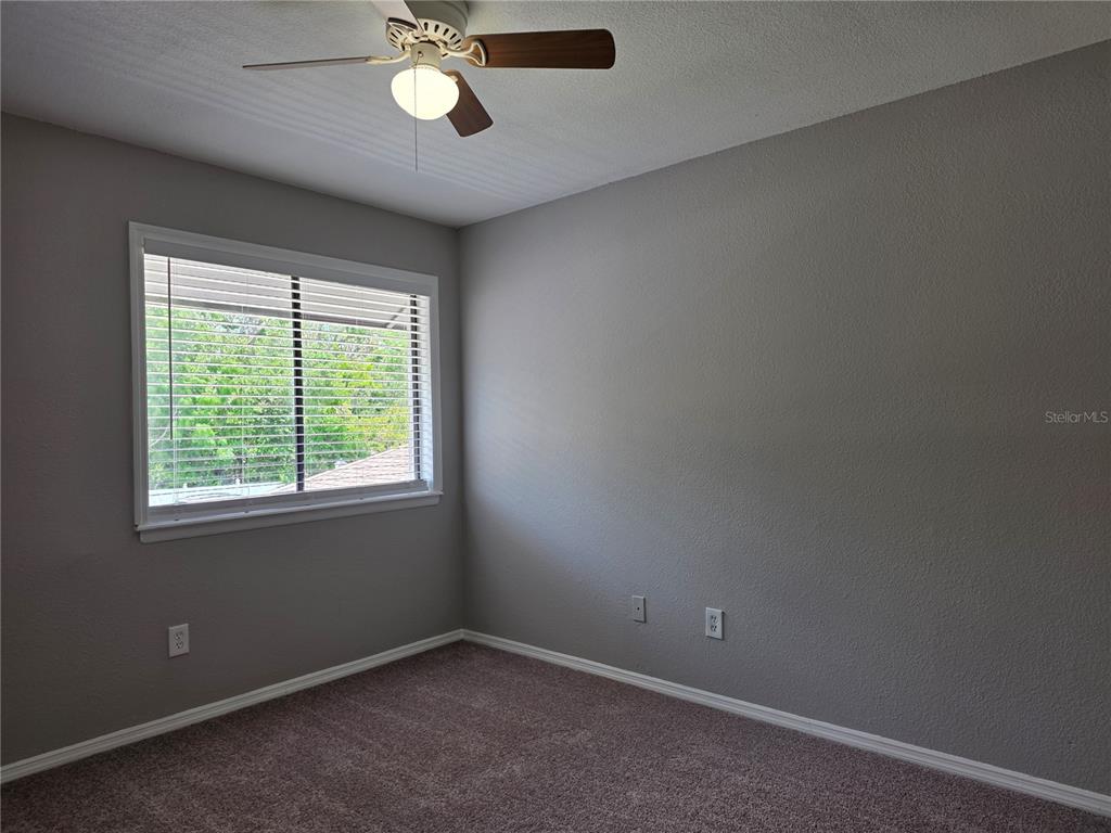 162 Olive Tree Circle Altamonte Springs, FL 32714 - Photo 27 of 47 an empty room with a window