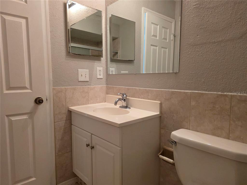 162 Olive Tree Circle Altamonte Springs, FL 32714 - Photo 35 of 47 a bathroom with a sink toilet and mirror