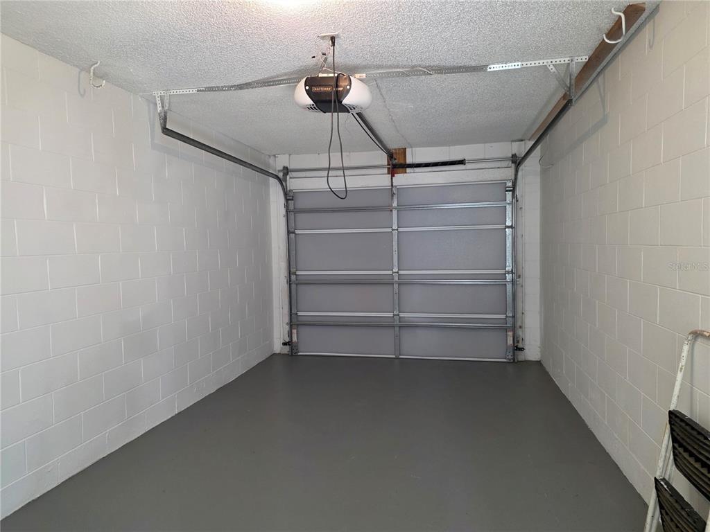 162 Olive Tree Circle Altamonte Springs, FL 32714 - Photo 5 of 47 a view of walk in closet with empty racks