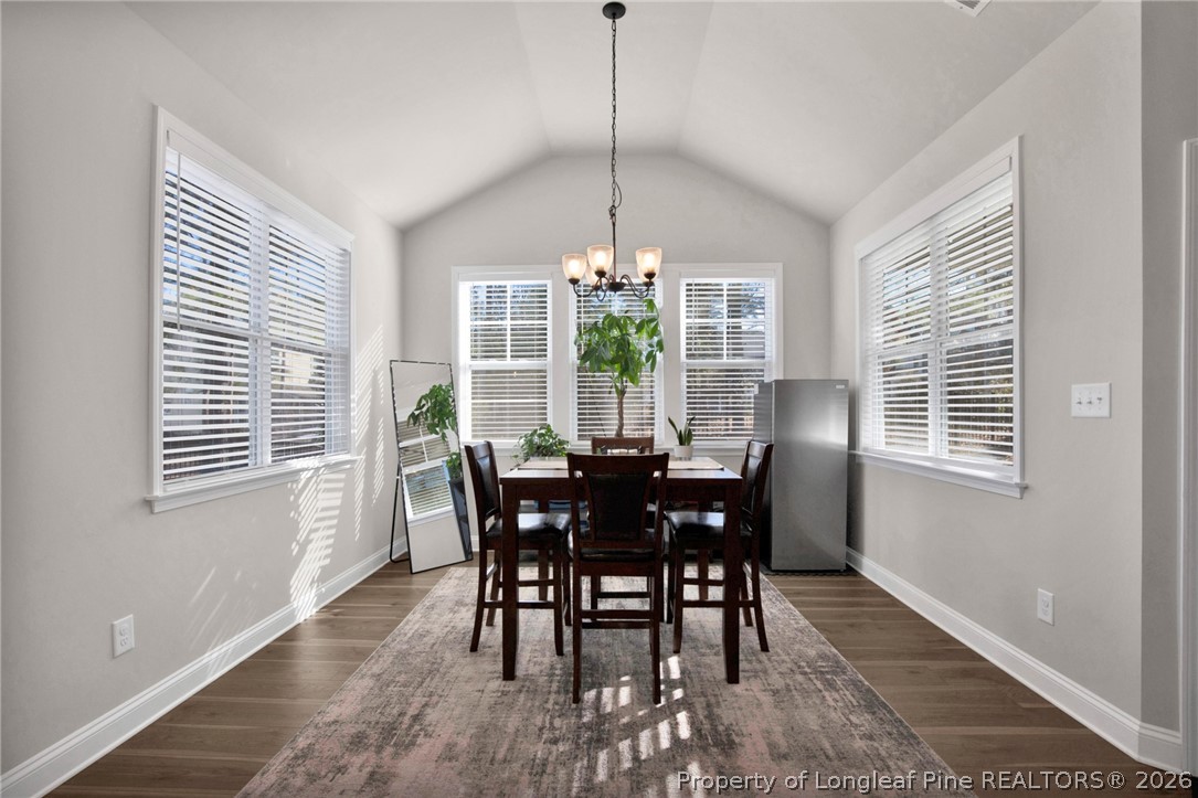 224 Timber Skip Drive Spring Lake, NC 28390 - Photo 11 of 30 a view of a dining room with furniture window and outside view