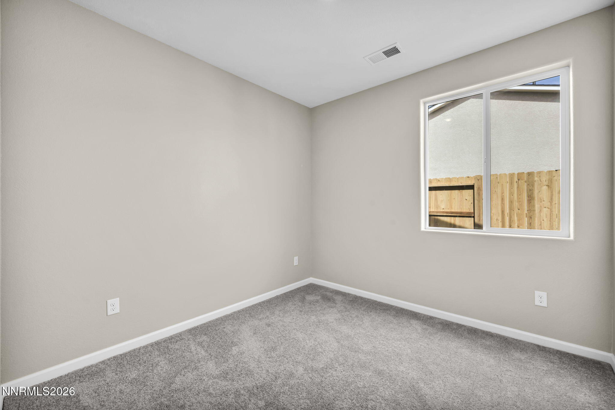 6668 Morgan Mill Road, Unit HOMESITE 15 Carson City, NV 89701 - Photo 13 of 25 an empty room with a window