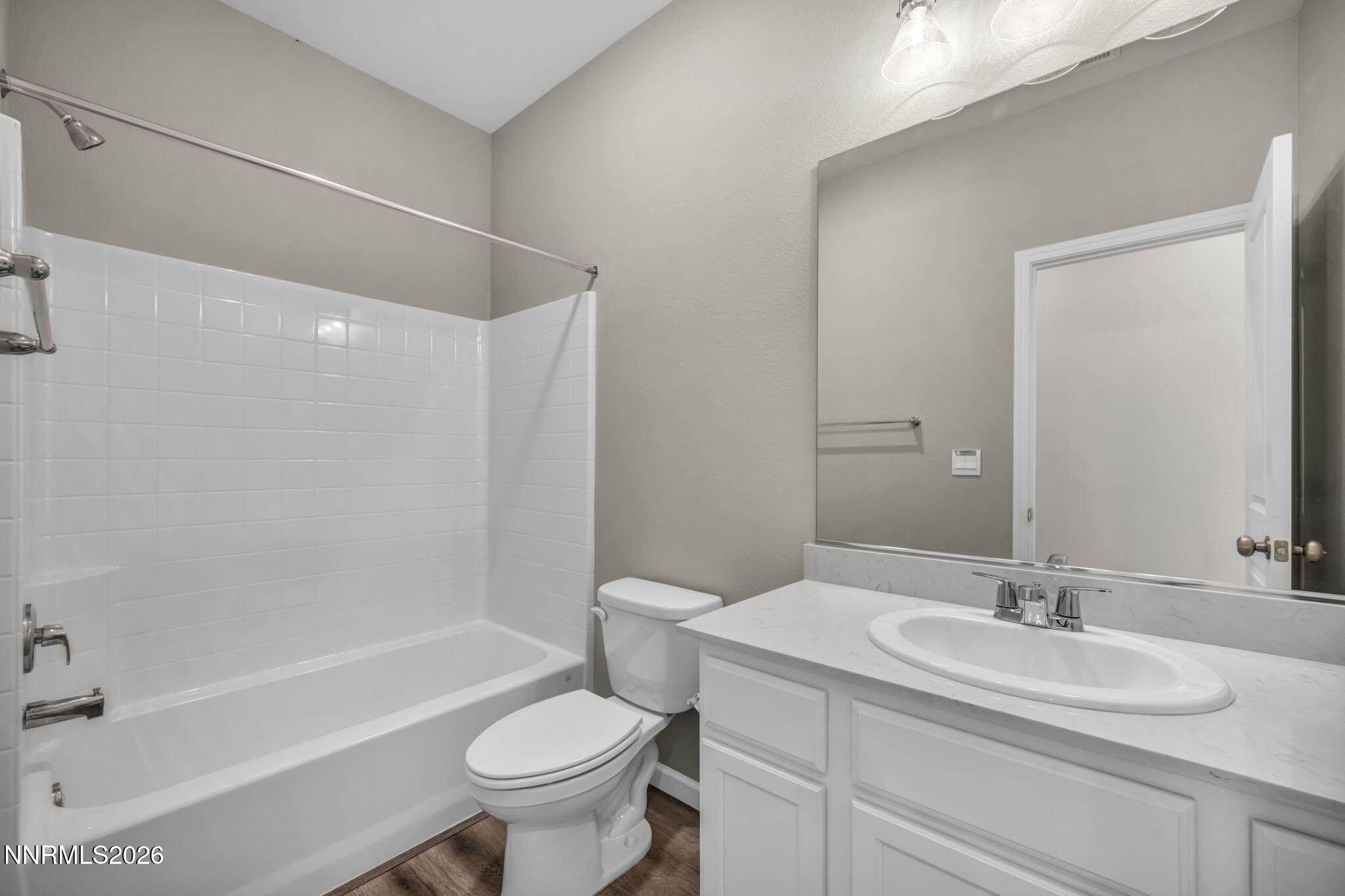 6668 Morgan Mill Road, Unit HOMESITE 15 Carson City, NV 89701 - Photo 17 of 25 a bathroom with a sink toilet and a bathtub