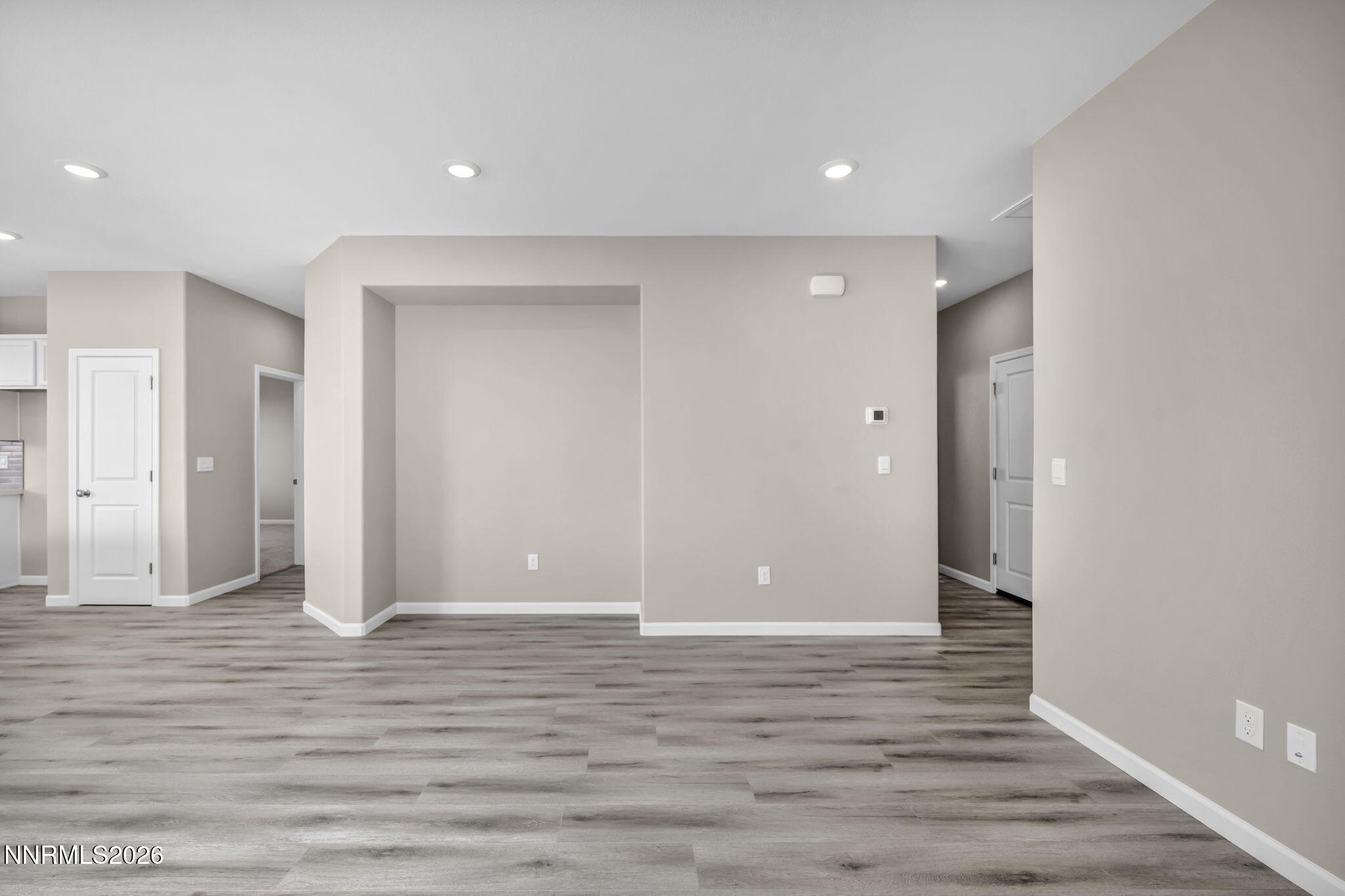 6668 Morgan Mill Road, Unit HOMESITE 15 Carson City, NV 89701 - Photo 9 of 25 a view of room with wooden floor