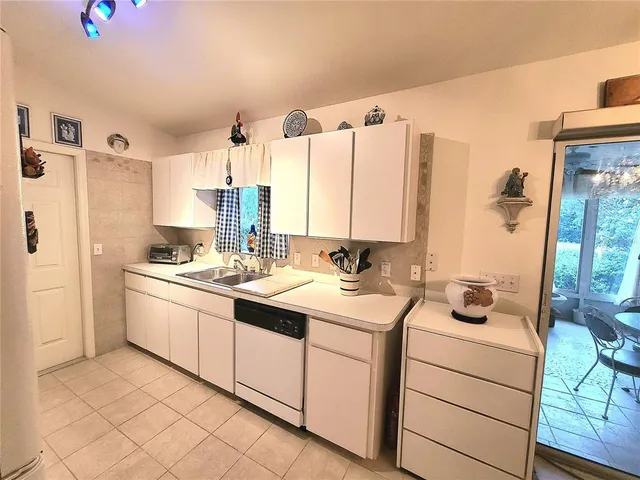 a view of bathroom with dual sinks