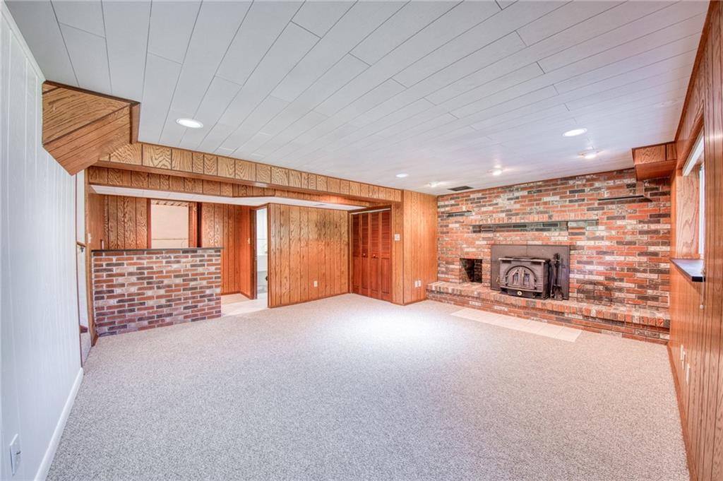 7315 Ringertown Road Export, PA 15632 - Photo 20 of 38 Family room with wood burning insert.