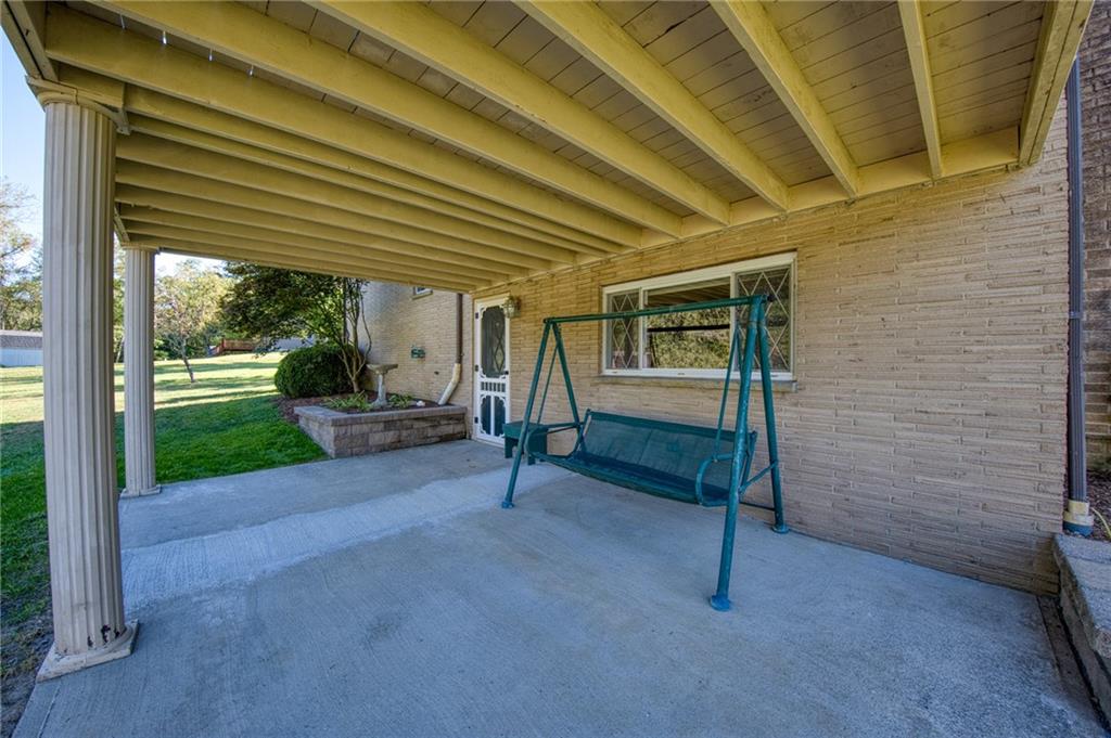 7315 Ringertown Road Export, PA 15632 - Photo 27 of 38 Patio overlooking the fruit trees and swing.