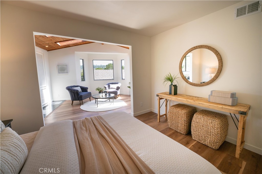 675 Huntington Road Cambria, CA 93428 - Photo 18 of 30 a living room with furniture and a mirror