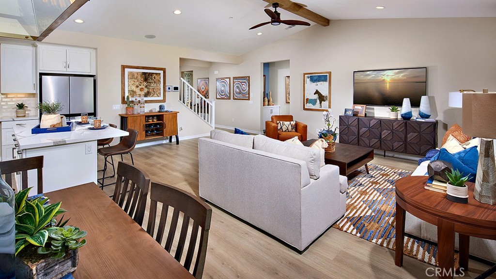 32480 Boseman Trail Winchester, CA 92596 - Photo 3 of 10 a living room with furniture and a flat screen tv