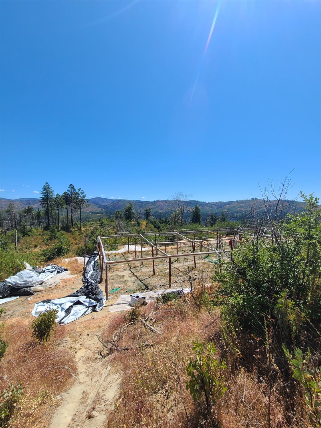 0 Hog Ranch Road Oroville, CA 95965 - Photo 4 of 6 a view of a lake with a mountain