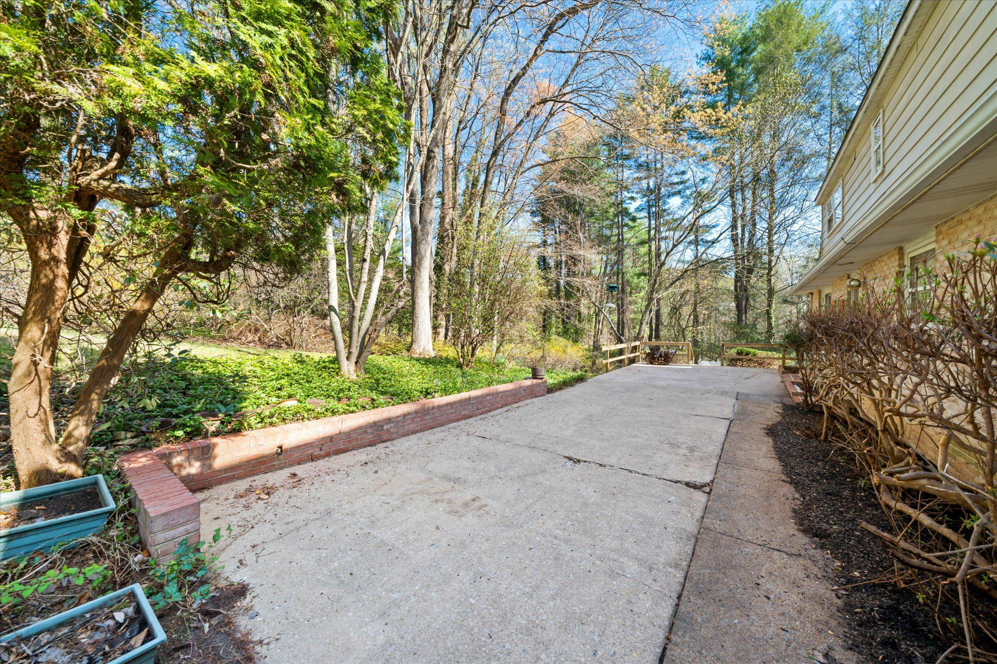859 Yorklyn Road Hockessin, DE 19707 - Photo 23 of 28 Serene patio with lush greenery.