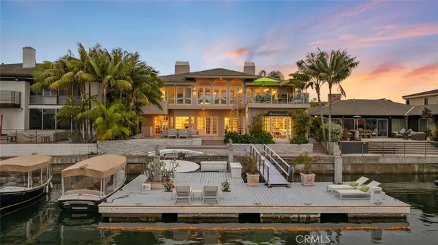 a view of multiple houses with a swimming pool