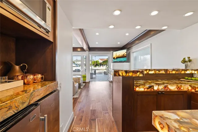 a view of entryway with wooden floor
