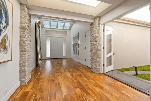 a bedroom with a bed and a fireplace