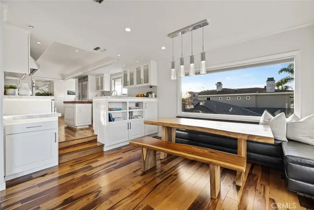 a bathroom with a bathtub shower and a sink