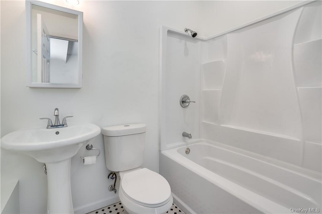Lot 1 Hillside Lake Road Wappingers Falls, NY 12590 - Photo 15 of 20 a bathroom with a sink toilet and shower