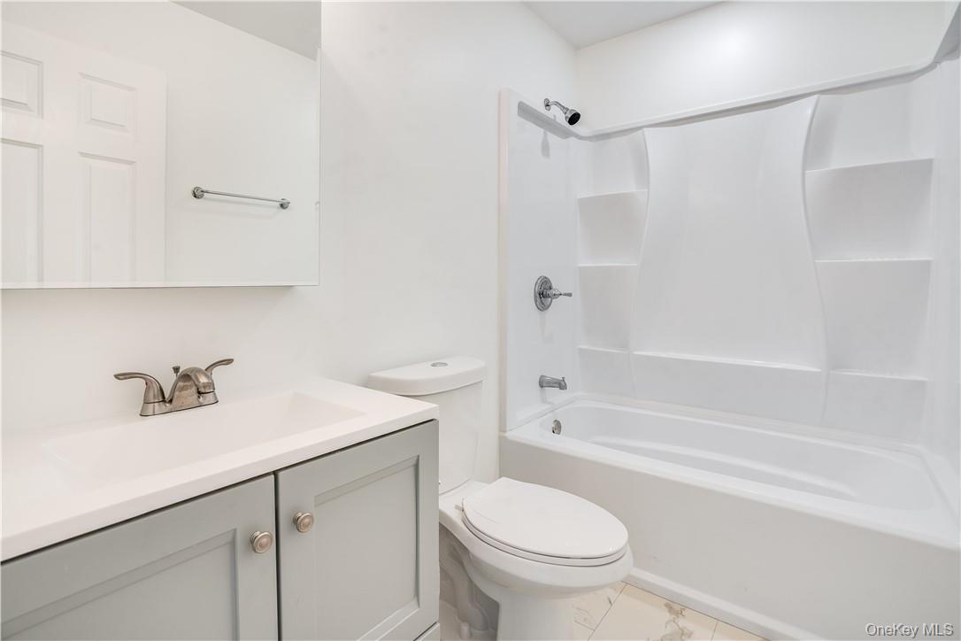 Lot 1 Hillside Lake Road Wappingers Falls, NY 12590 - Photo 18 of 20 a bathroom with a sink toilet and shower