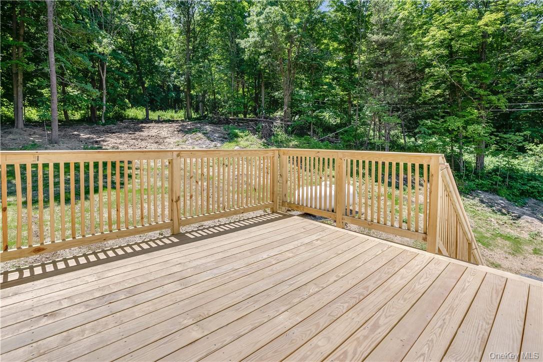 Lot 1 Hillside Lake Road Wappingers Falls, NY 12590 - Photo 20 of 20 a balcony with wooden floor