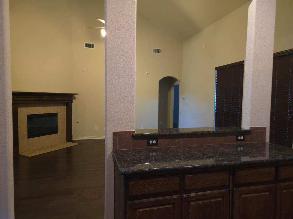 9316 Turtle Pass Fort Worth, TX 76177 - Photo 14 of 38 a bathroom with a sink and a mirror