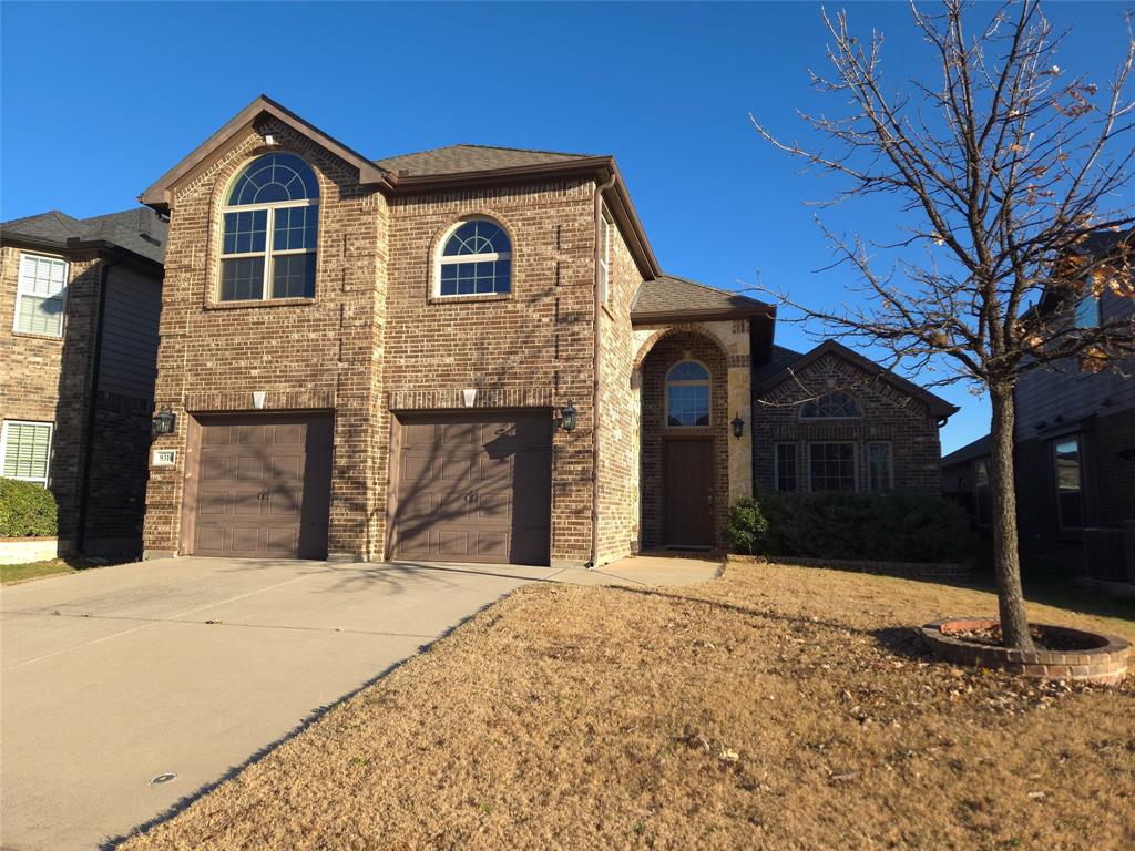 9316 Turtle Pass Fort Worth, TX 76177 - Photo 3 of 38 a front view of a house with a yard