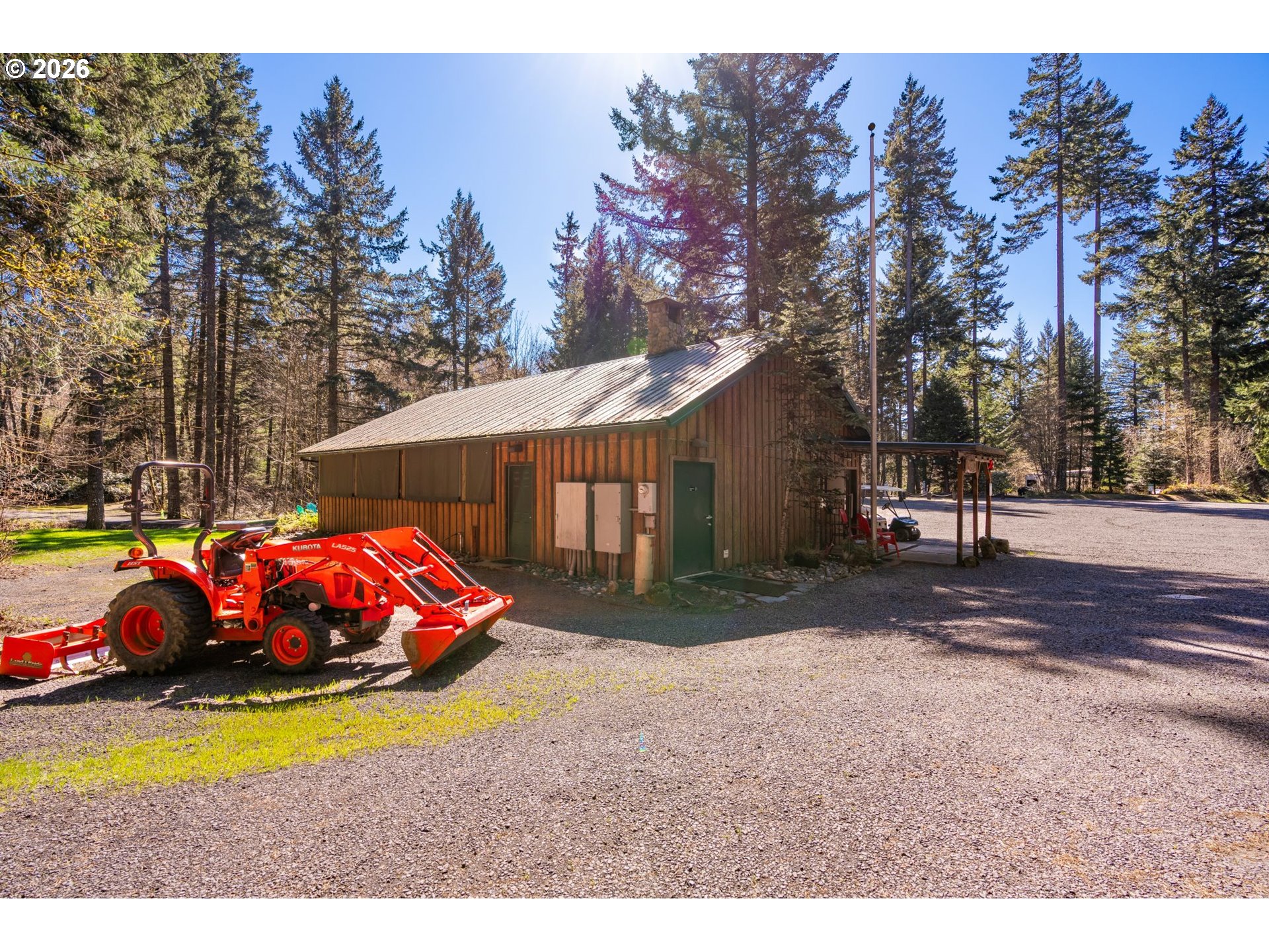 112 Bylin Road Stevenson, WA 98648 - Photo 5 of 42 a front view of a house with a yard and garage