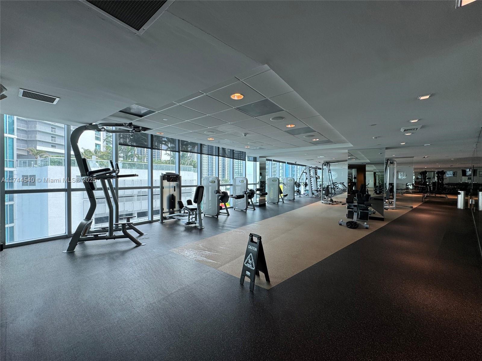 900 Biscayne Boulevard, Unit 4708 Miami, FL 33132 - Photo 34 of 39 a view of a room with gym equipment