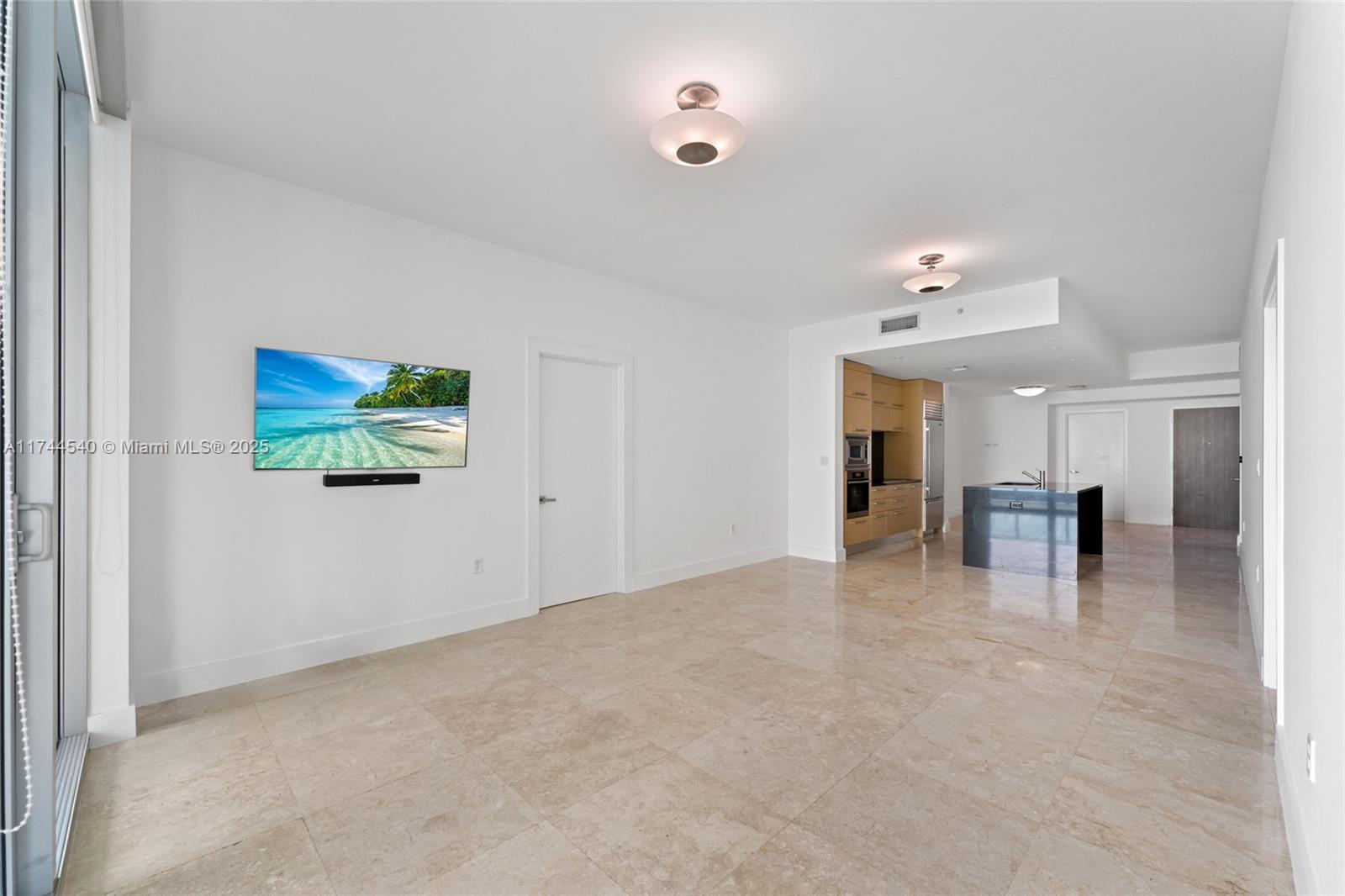 900 Biscayne Boulevard, Unit 4708 Miami, FL 33132 - Photo 6 of 39 a view of livingroom and kitchen with furniture