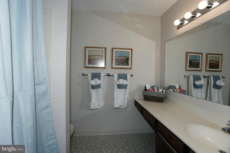2252 Cedar Cove Court Reston, VA 20191 - Photo 13 of 26 a kitchen with a sink and a stove