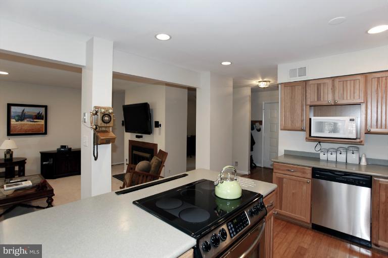 2252 Cedar Cove Court Reston, VA 20191 - Photo 20 of 26 a kitchen with sink stove and refrigerator