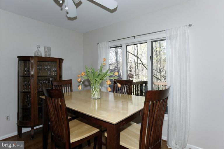 2252 Cedar Cove Court Reston, VA 20191 - Photo 21 of 26 a view of a dining room with furniture window and outside view