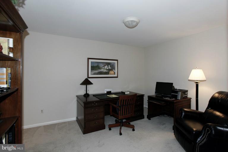 2252 Cedar Cove Court Reston, VA 20191 - Photo 7 of 26 a view of a workspace with furniture and a window