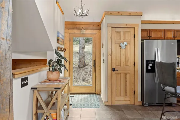 a view of living room with furniture and a window