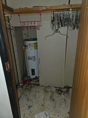 a view of a storage and utility room