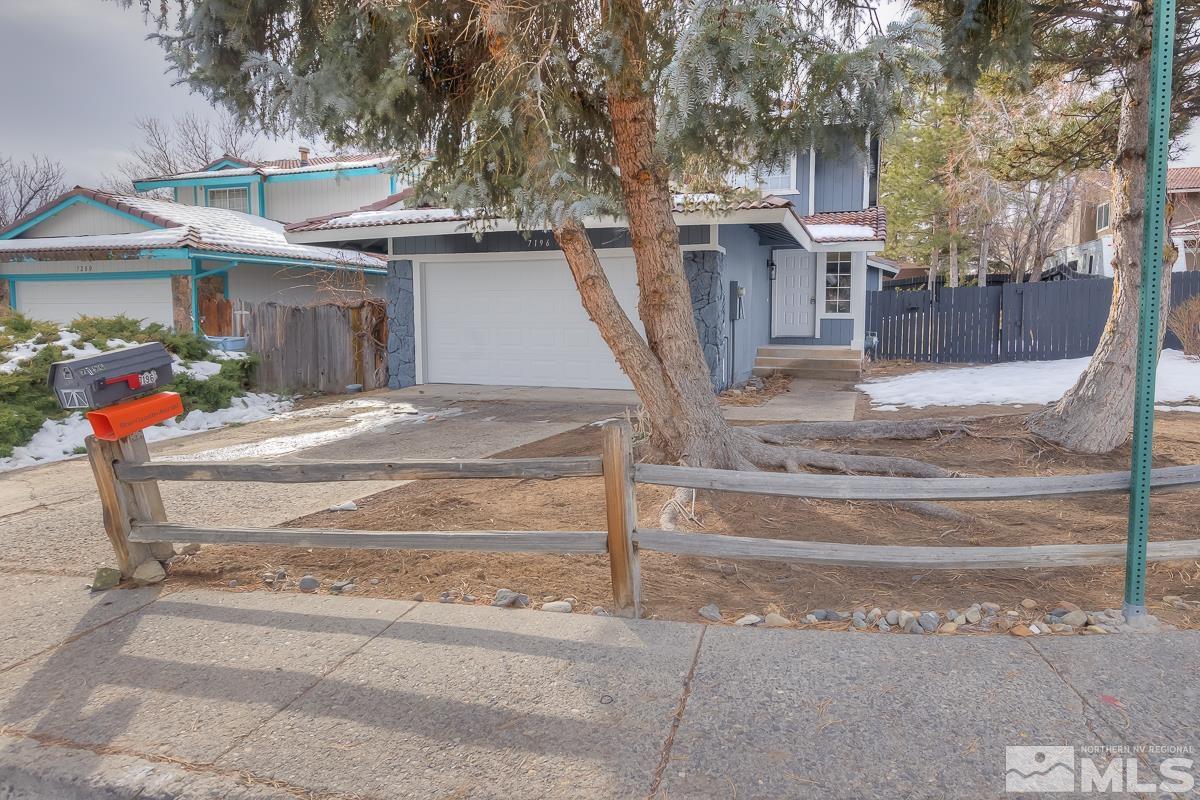 7196 Indigo Circle Reno, NV 89506 - Photo 1 of 33 a view of a house with street
