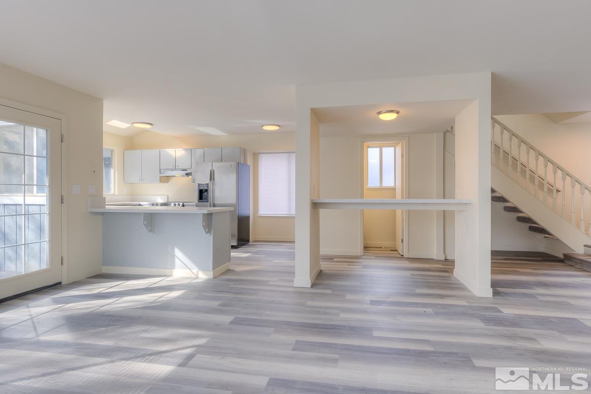 7196 Indigo Circle Reno, NV 89506 - Photo 14 of 33 a view of kitchen with wooden floor