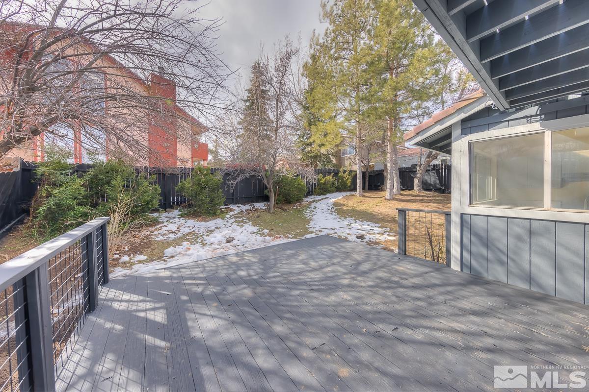 7196 Indigo Circle Reno, NV 89506 - Photo 23 of 33 a backyard of a house with yard and outdoor seating
