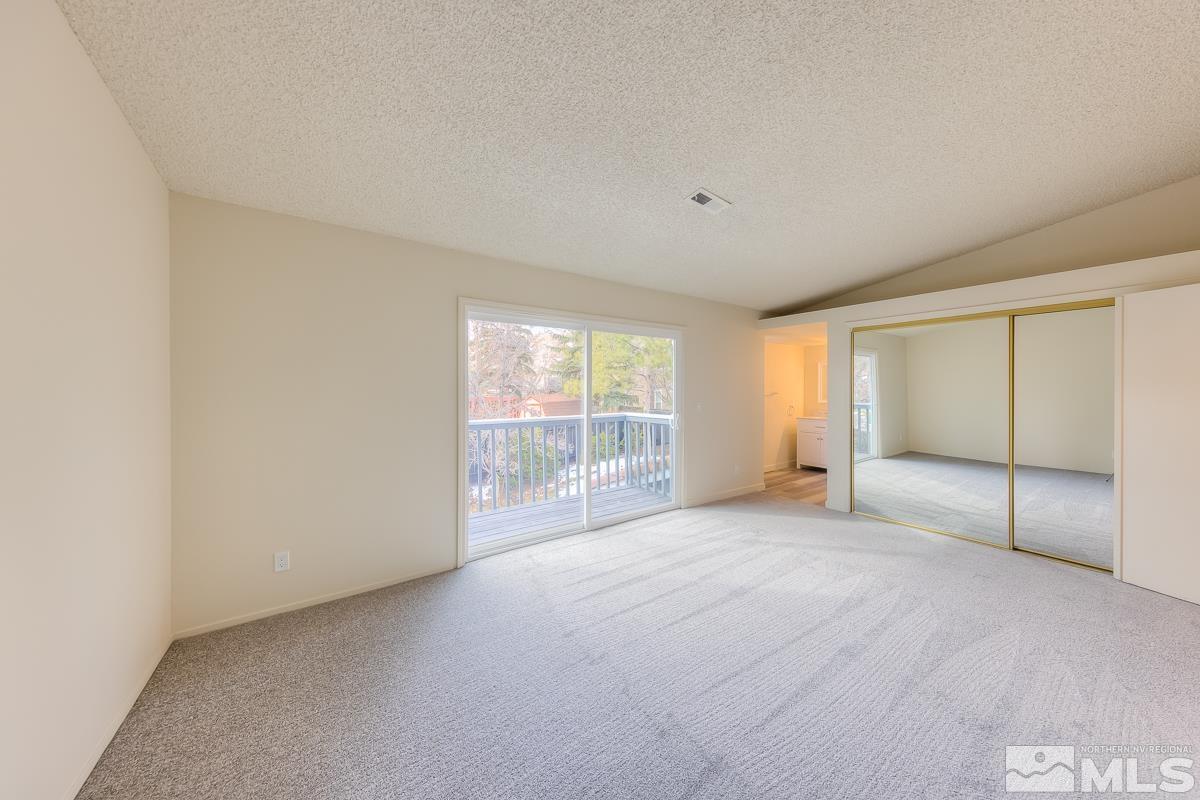7196 Indigo Circle Reno, NV 89506 - Photo 29 of 33 a view of an empty room with a window