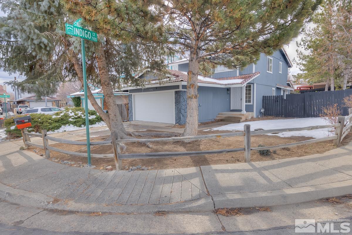 7196 Indigo Circle Reno, NV 89506 - Photo 3 of 33 a view of a house with a yard