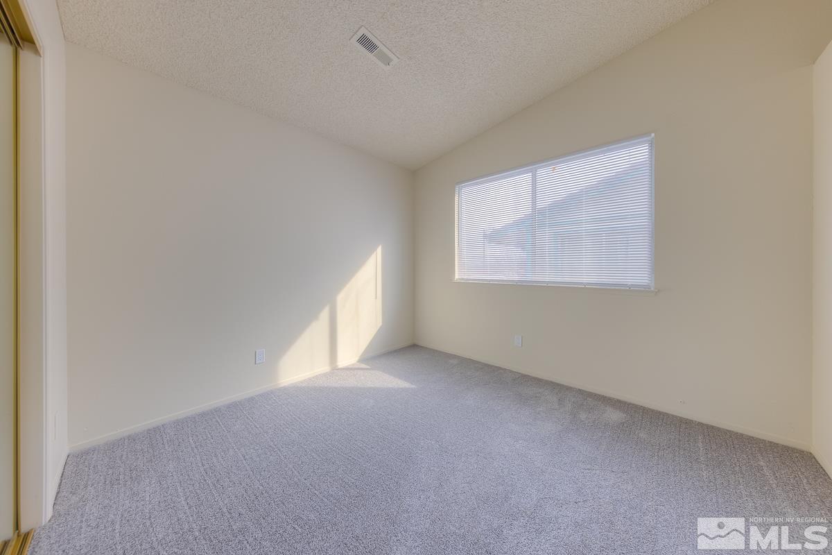 7196 Indigo Circle Reno, NV 89506 - Photo 31 of 33 an empty room with a window