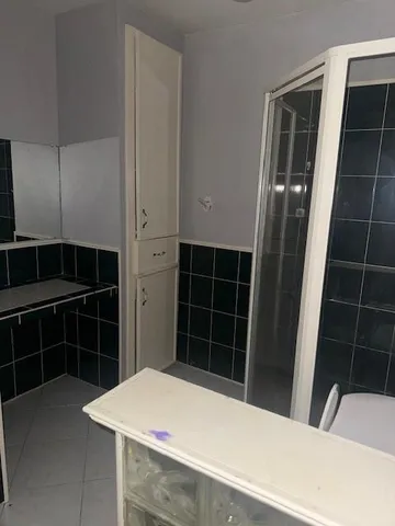 a view of an empty room with a door