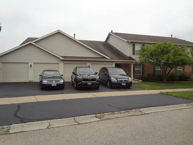 a car parked in front of a house