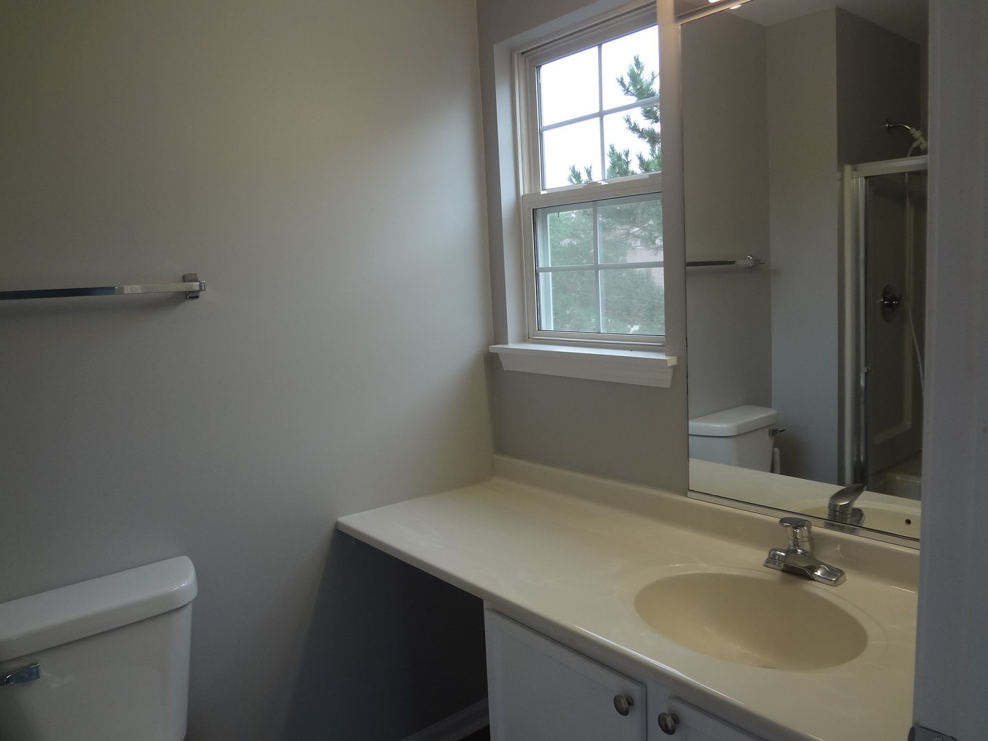 1127 North Red Oak Circle, Unit 4 Round Lake Beach, IL 60073 - Photo 15 of 31 a bathroom with a sink and a toilet
