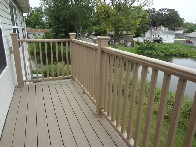 a view of a wooden deck with city view