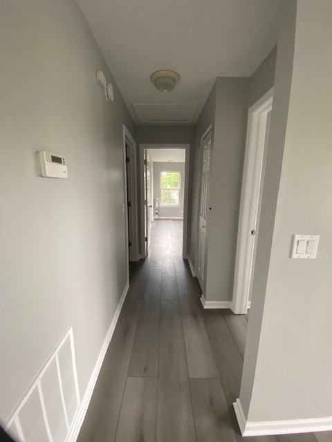1127 North Red Oak Circle, Unit 4 Round Lake Beach, IL 60073 - Photo 31 of 31 a view of a hallway with wooden floor