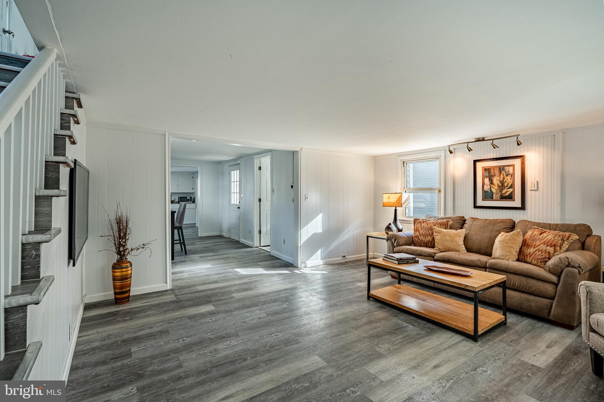 325 Howell School Road Bear, DE 19701 - Photo 9 of 36 Formal living room
with new paint and flooring