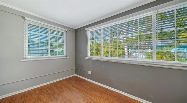 a view of a room with a large window