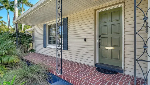 a view of a door and a window