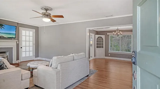 a living room with furniture and a window